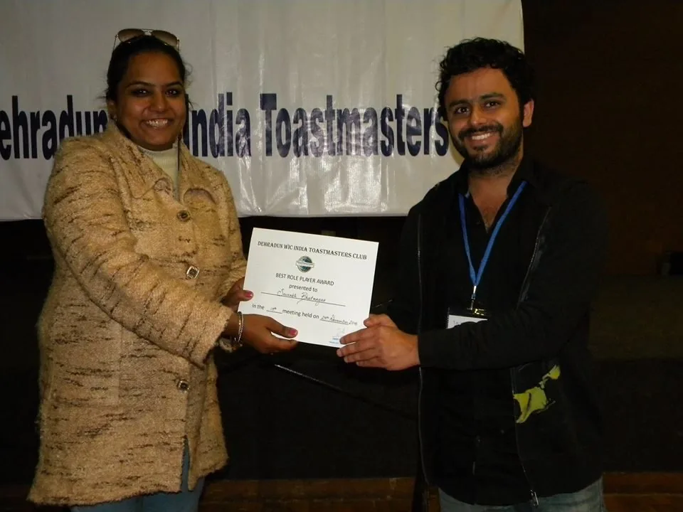 Saurabh Bhatnagar receiving a Best Role Player award at Dehradun WIC India Toastmasters Club