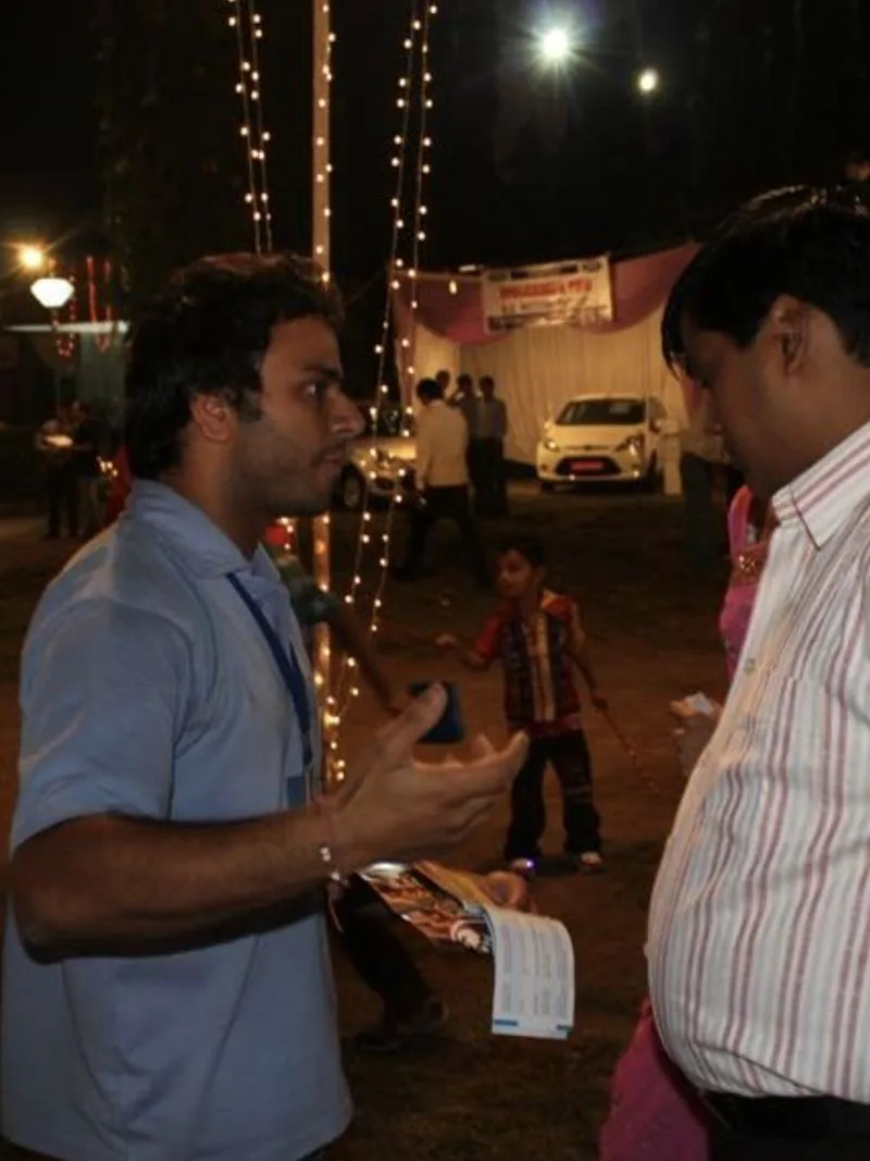 Saurabh Bhatnagar selling in person at an event, 2012
