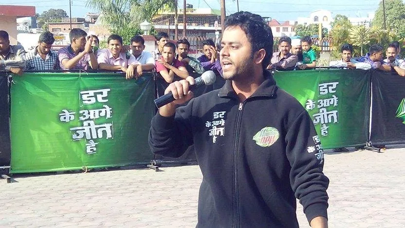 Saurabh Bhatnagar anchoring a brand event with a microphone