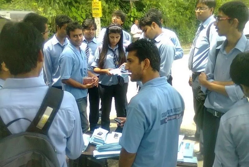 Selling coupon books to students outside a school